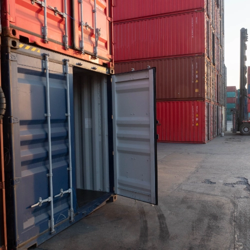 Open shipping container at an industrial storage yard